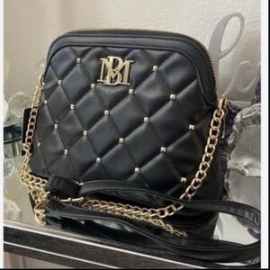 Badgley Mischka Diamond-Stitched Bag 
Excellent condition like me only used once
